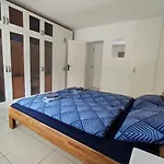 16 Sunset View Апартаменти *